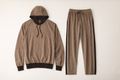 Baghatur luxury cashmere tracksuit in warm taupe on off-white background